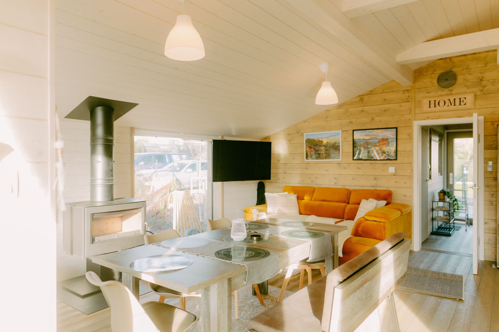 Bright timber living and dining room inside Bohemian Homes